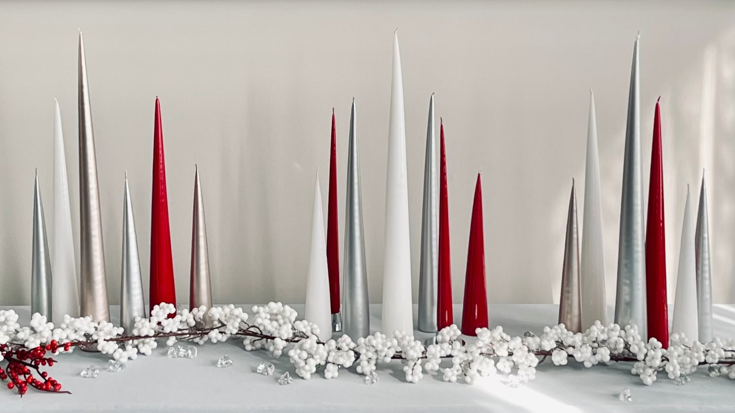 Table with holiday taper candles in red, white and silverslider_item_7ETaah